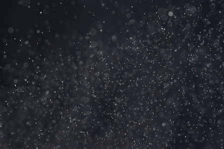 abstract splashes of water on a black backgroundの写真素材