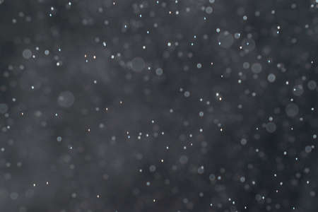 abstract splashes of water on a black backgroundの写真素材