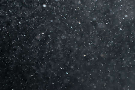 abstract splashes of water on a black backgroundの写真素材