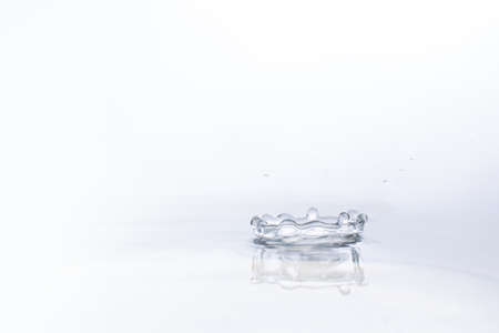 Water drop on water backgroundの写真素材