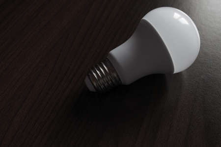 led bulb on wooden backgroundの写真素材