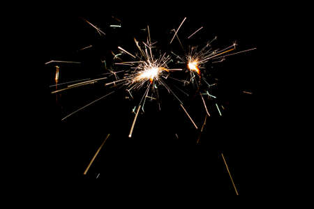 Fire sparklers on black background - Imageの写真素材