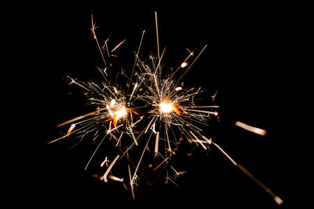 Fire sparklers on black background - Imageの写真素材