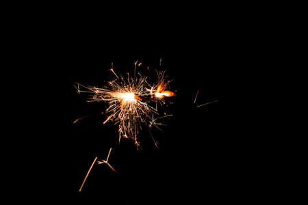 Fire sparklers on black background - Imageの写真素材