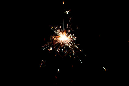 Fire sparklers on black background - Imageの写真素材