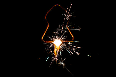 Fire sparklers on black background - Imageの写真素材