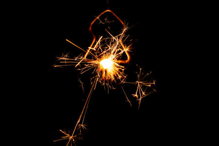 Fire sparklers on black background - Imageの写真素材
