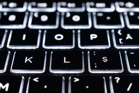 Closeup of laptop keyboard illumination, backlit keyboardの写真素材