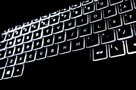 Closeup of laptop keyboard illumination, backlit keyboardの写真素材