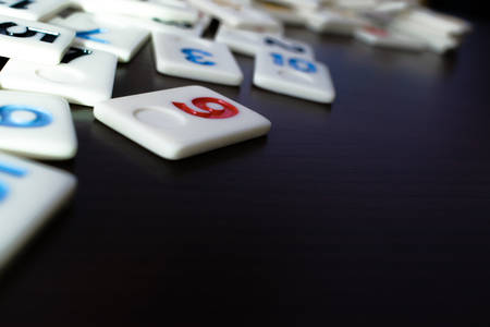 pieces of rummy placed in order on the tableの写真素材