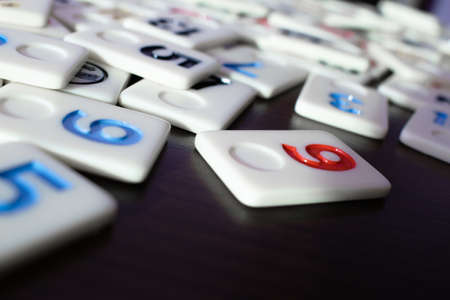 pieces of rummy placed in order on the tableの写真素材