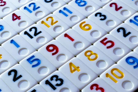 pieces of rummy placed in order on the tableの写真素材