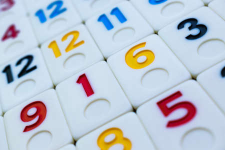 pieces of rummy placed in order on the tableの写真素材