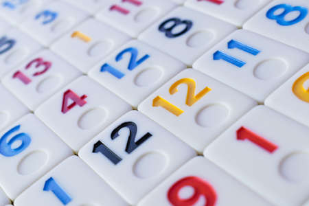 pieces of rummy placed in order on the tableの写真素材