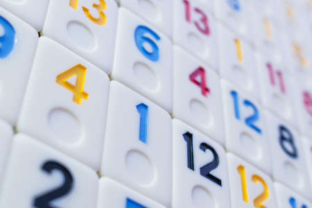 pieces of rummy placed in order on the tableの写真素材