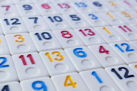 pieces of rummy placed in order on the tableの写真素材