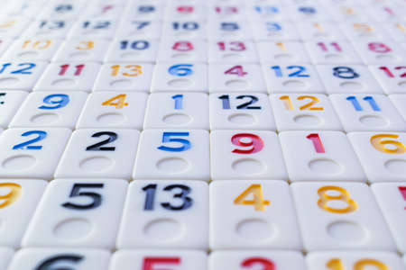 pieces of rummy placed in order on the tableの写真素材