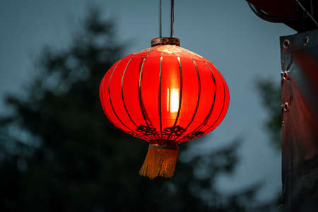 Chinese red lantern hanging on the stainless steel railの写真素材
