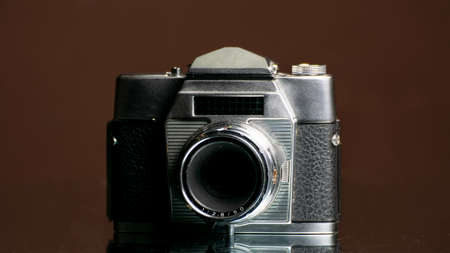 old camera on dark backgroundの写真素材