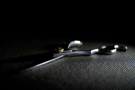professional scissors on black backgroundの写真素材