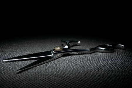 professional scissors on black backgroundの写真素材