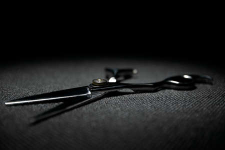 professional scissors on black backgroundの写真素材