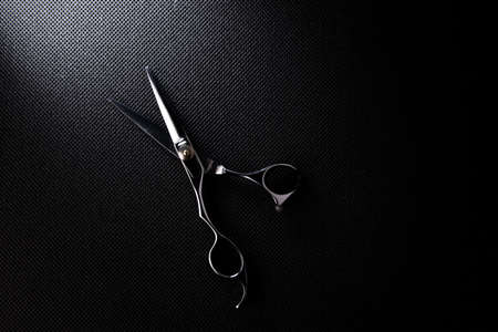 professional scissors on black backgroundの写真素材