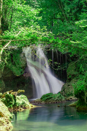 La Vaioaga waterfall encountered while trekking on Nera Gorges during summer, Romaniaの写真素材