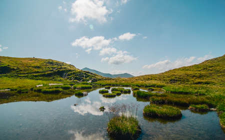 Reflection of mountains and clouds in the glacial lake. picture taken on 03.09.2019の写真素材