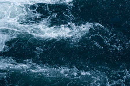 Blue and turquoise water with irregular wave structure