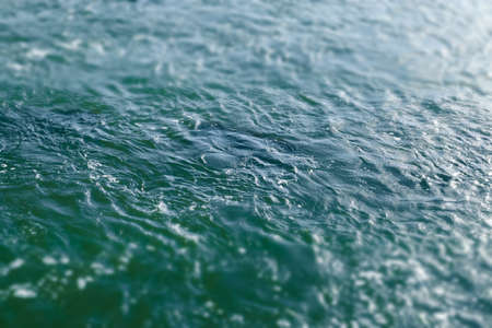 Blue and turquoise water with irregular wave structure