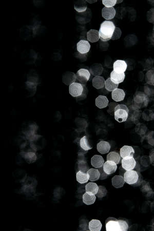 abstract splashes of water on a black backgroundの写真素材