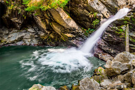 Waterfall mountain view close up. Mountain river waterfall landscape. Waterfall river sceneの写真素材