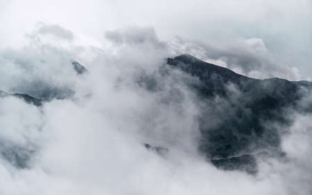 Landscape with Retezat mountains covered with clouds seen from 2485 meters. Retezat National Park, Hunedoara, Transylvania, Romaniaの写真素材