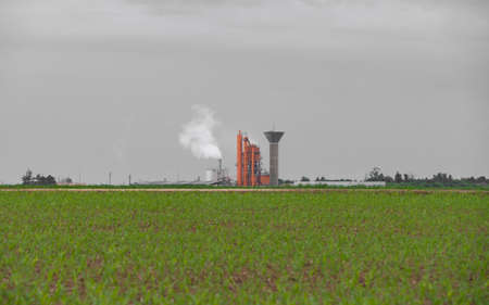 silver silos on agro manufacturing plant for processing drying cleaning and storage of agricultural products,の写真素材