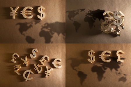 international currency unit collection by wood on recycled backgroundの写真素材