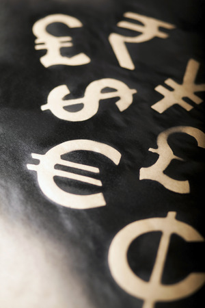 International black currency units on dappled backgroundの写真素材