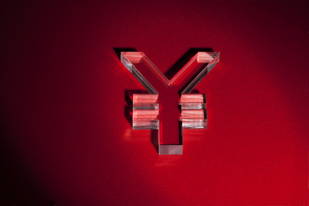 World's money currency icons on red backgroundの写真素材