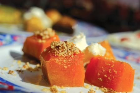 pumpkin sweet with nuts and cream in a dishの写真素材