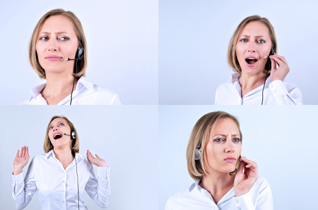 Young beautiful operator with headphone in call centerの写真素材