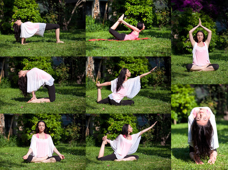 Young woman is doing yoga on green grass at parkの写真素材