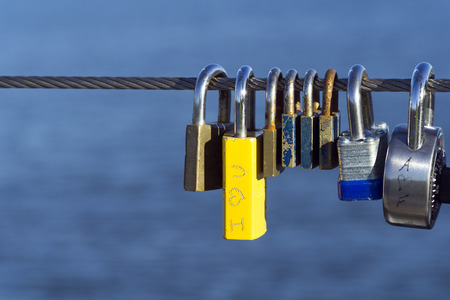 Padlocks hang on steel rope for wishing love or marriageのeditorial素材