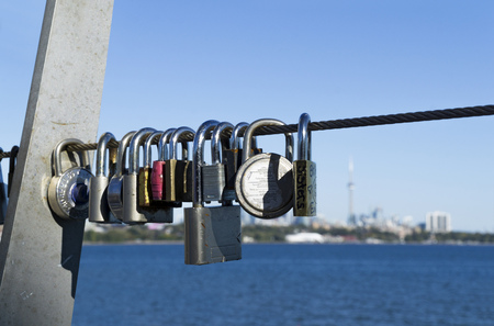 Padlocks hang on steel rope for wishing love or marriageのeditorial素材