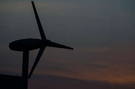 silhouette wind turbine in twilight time