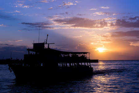 Passenger ship from Koh Larn at dusk,Pattaya,Thailandの写真素材