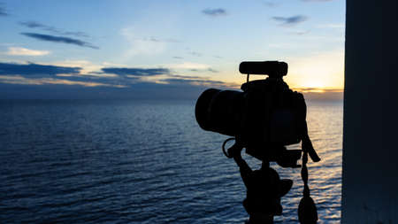 silhouette of camera at duskの写真素材