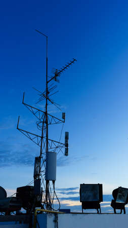 silhouette of antenna at twilightの写真素材