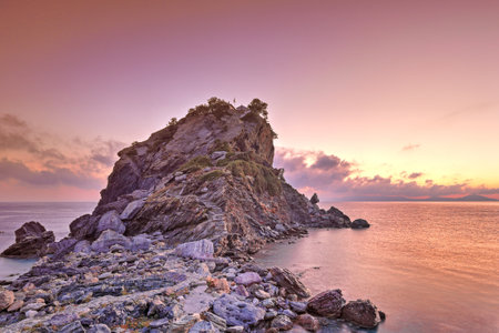 The sunrise at Agios Ioannis Kastri of Skopelos island, Greeceの写真素材