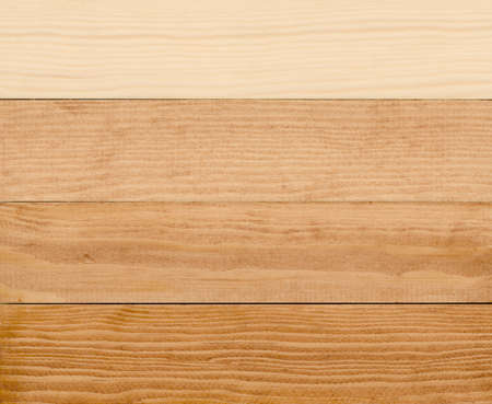 4 stages of wood painting from raw to three layers of paintの写真素材