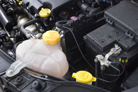 close up detail view under the hood of a carの写真素材